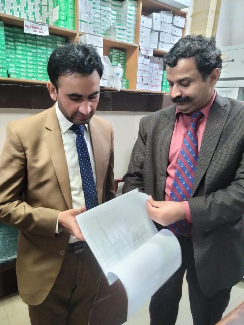 Al-Nisa representative during pharmacy visit with CEO health Okara